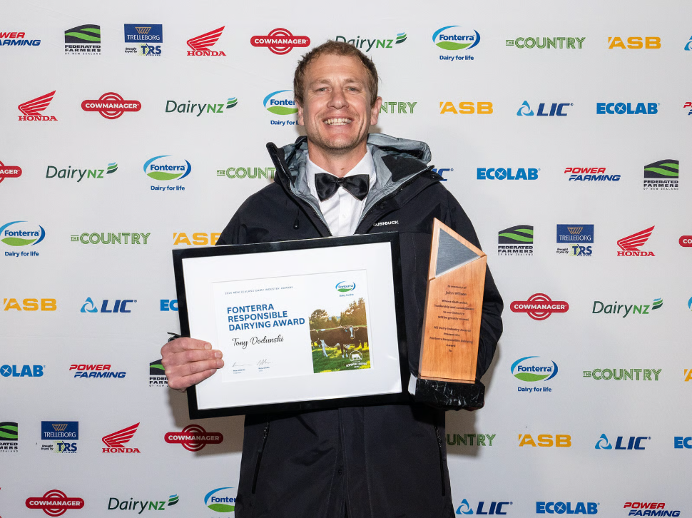 Tony Dodunski receiving a New Zealand dairy award